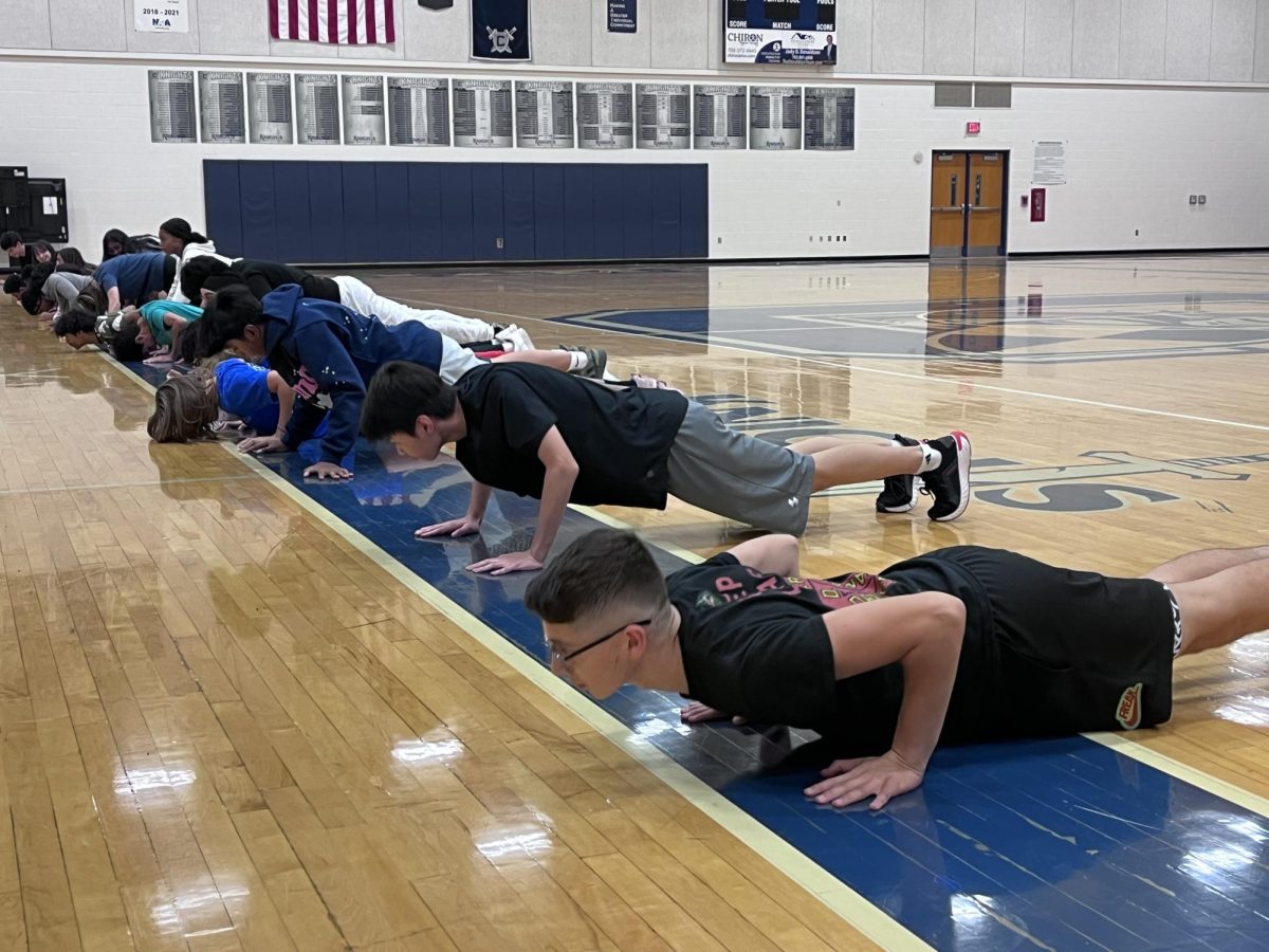 John Champe students completing their push-up fitness test