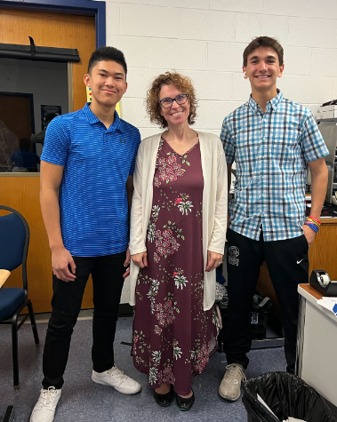 Mrs. Brown and two of her students formally dressed before interviews.