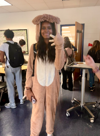 Sophomore Daniella Akilu is dressed in her favorite onesie for onesie day at John Champe. She was really excited to participate the day before. 