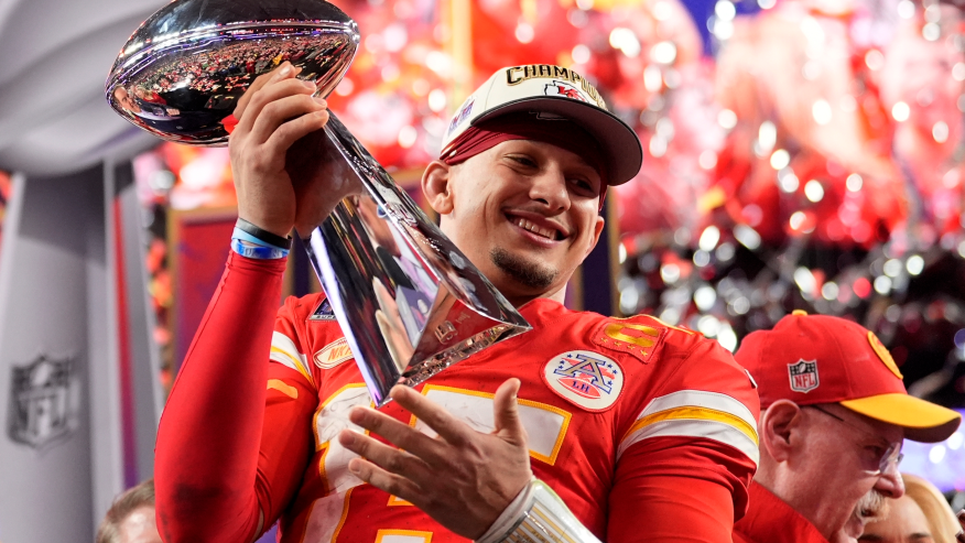 Kansas City Chiefs quarterback Patrick Mahomes celebrates with the trophy after the team’s win in overtime during Super Bowl LVIII on February 11th, 2024. 