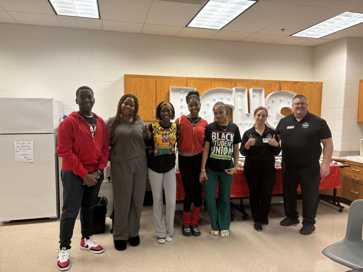 Members of the BSU helping out at the breakfast and bringing an end to Black History Month.