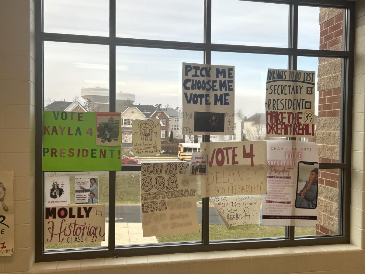 Candidates for the upcoming SCA and class council elections place posters around the school.