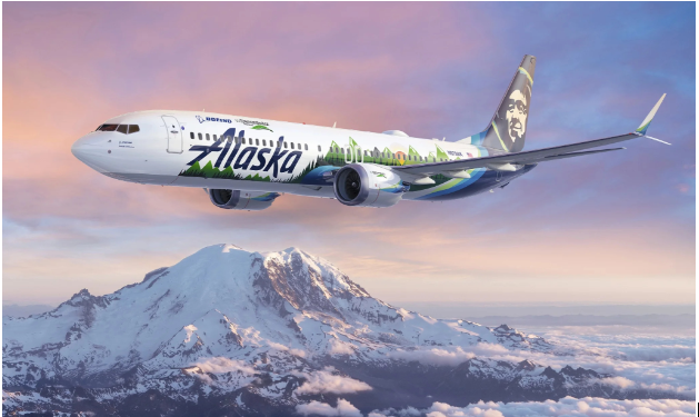 Alaskan Airline Plane soars in the clouds. 