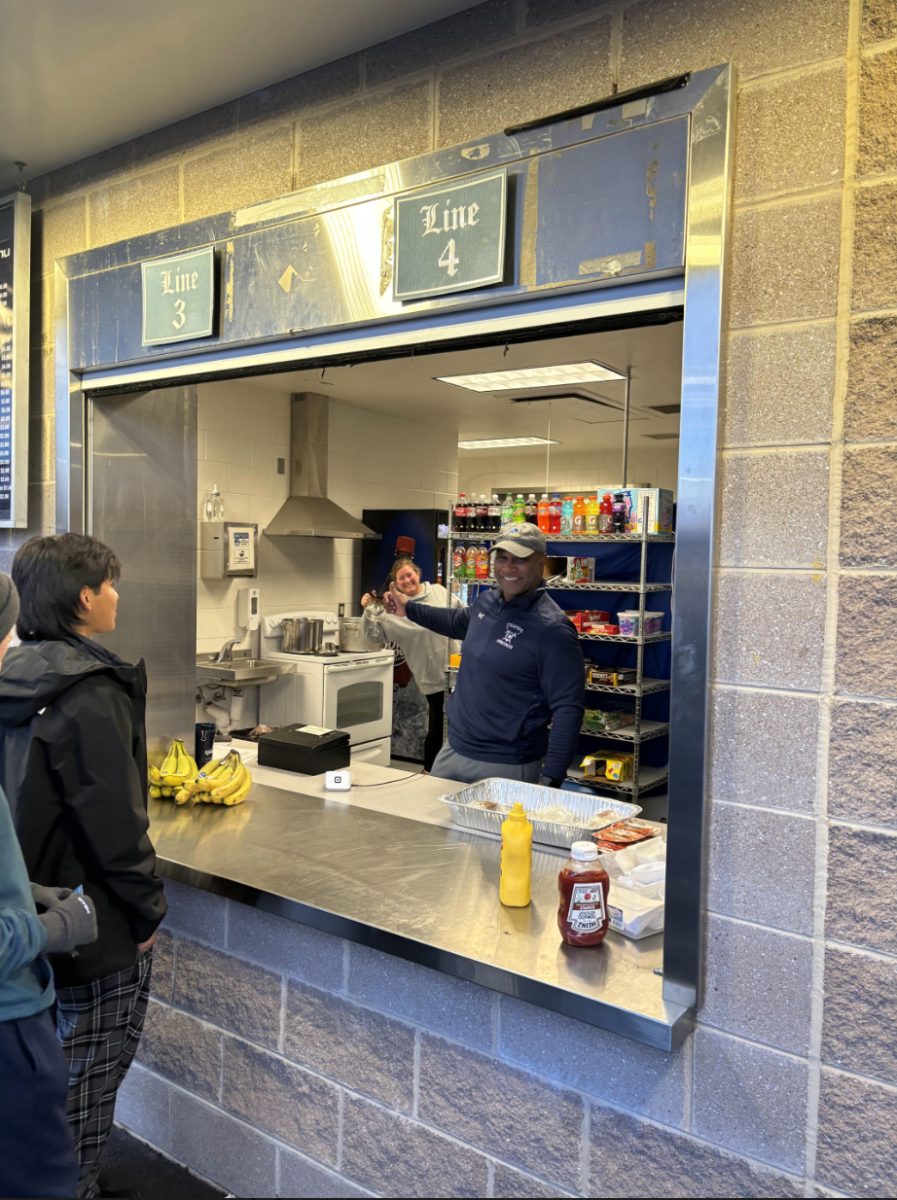 Gregory Spiller and Amanda Kann helping out after school at concessions so kids have their favorite snacks during the sporting events. 
