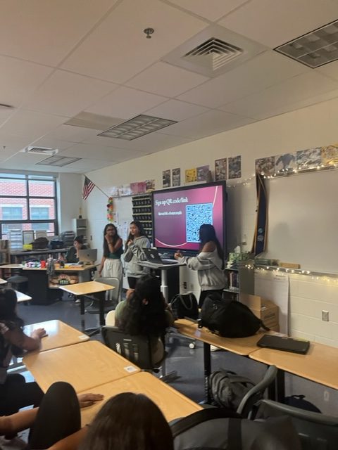 Champe Rangila's leadership presents information during their interest meeting. 