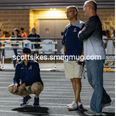 Head Athletic Director Anthony Royse watching the Varsity Knights Football team play Lightridge High School. Royse comes to almost every football game to cheer on the Knights. 
