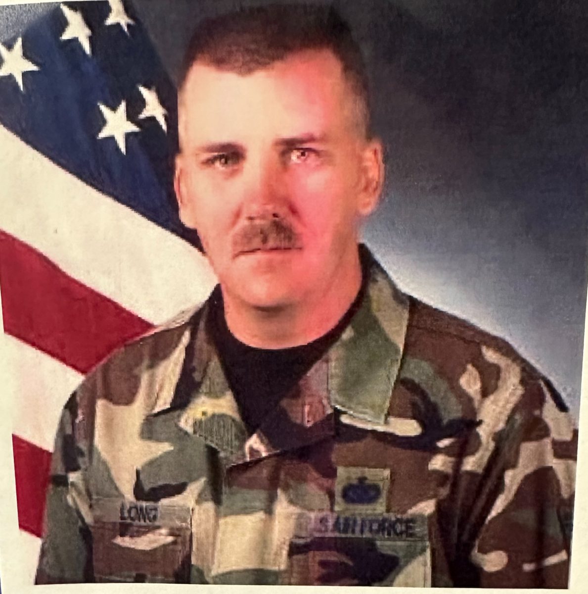 Photo of school counselor John Long, when serving in the Air Force