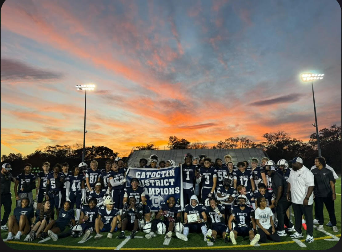 The Champe Football Team posing for a picture after defeating Broad run in their district final. The Knights have worked hard inside and outside of practice to prepare for the season. 