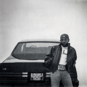 The cover for Lamar's sixth studio album. The name of the album refers to the 1987 Buick Grand National Experimental, which is the car Lamar is standing in front of.