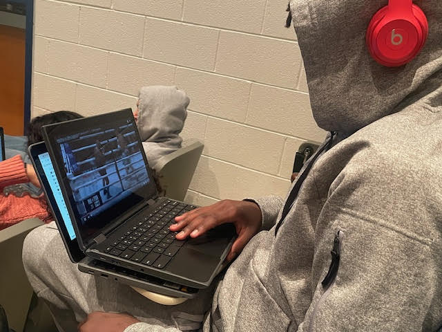 Freshman Makai Fongyen watches highlights of the fight weeks later. Fongyen watched the fight live and still found the highlights interesting weeks after the event.
