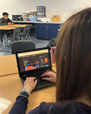 Students keeping up with the presidential election and the results during classes 
