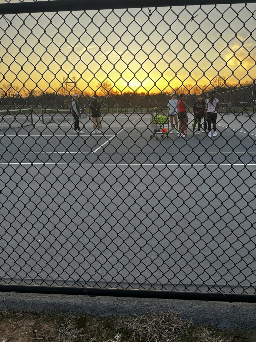 Picture taken as students are wrapping up  tennis tryouts. 