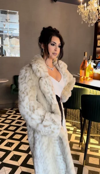 Sarah Arcuri wearing her signature mob wife outfit.