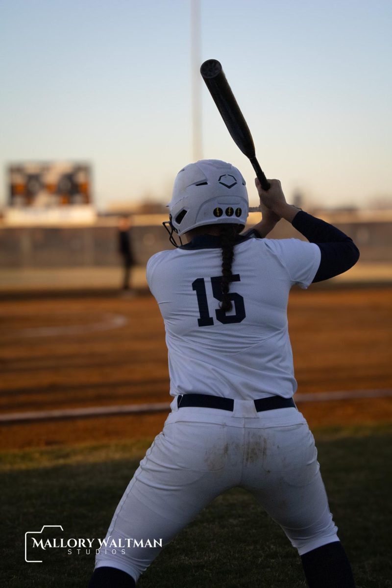 Sydney Perez on deck to bat at the first home game of her senior year.