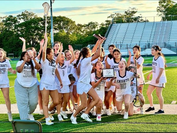 Girls' Lacrosse wins first-ever banner and advances to Regionals.