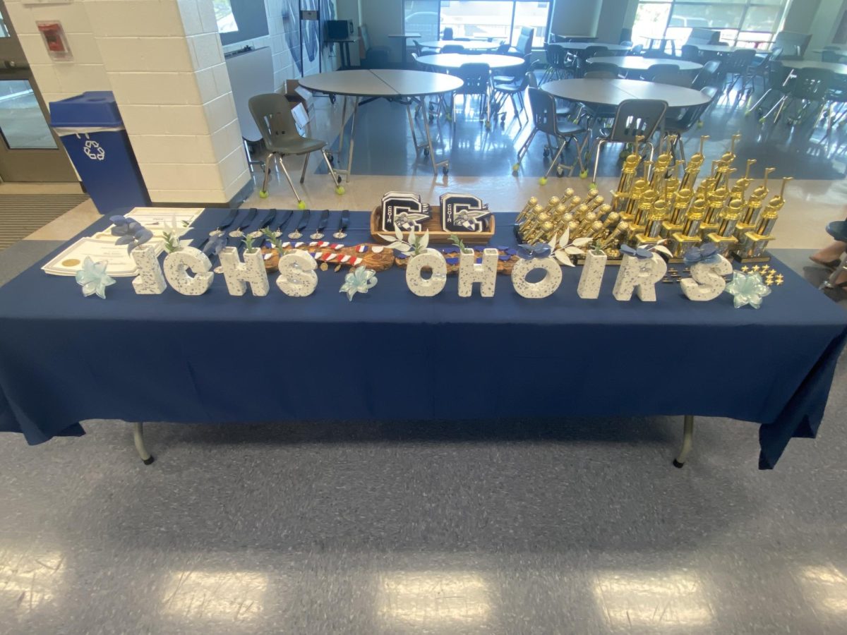 This is a photo taken of the awards table. Taken at the choir banquet. This photo shows how many different things students are being awarded for and how important choir is to students at Champe. 